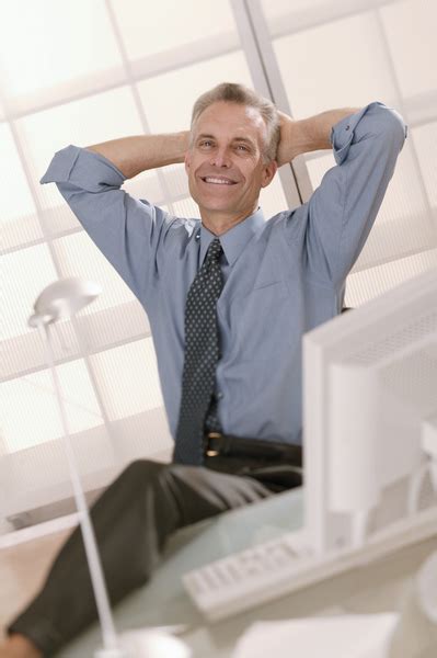 businessman leaning   chair relaxing  photo  freeimages
