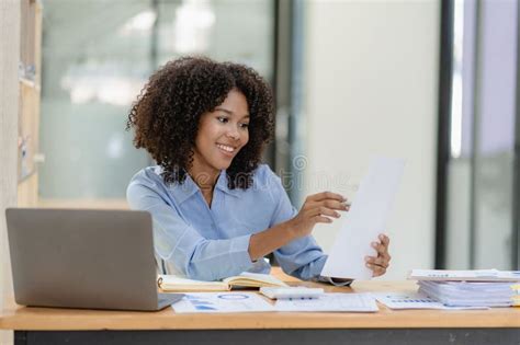 African American Businesswoman Working With Laptop And Financial