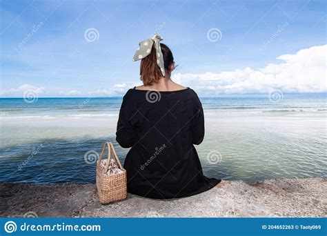 Thai Girl Sitting Alone on the Beach Stock Image - Image of islands, asia: 204652263