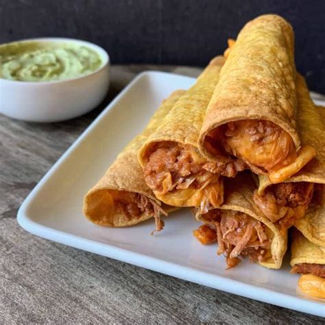 Bean and Cheese Air Fryer Taquitos with 2-Ingredient Guacamole Dip