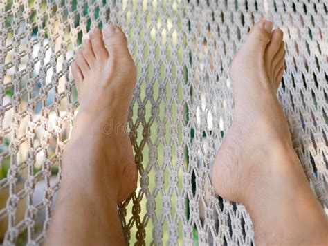 A Man`s Feet On A Hammock Relaxation Stock Image Image Of Feet