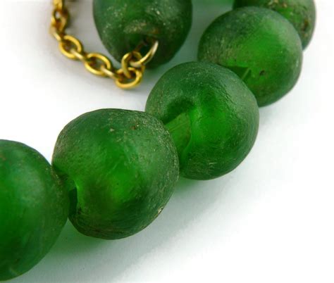 Christian Lacroix Vintage Antique Green Glass Beads And Deity Medallion Necklace For Sale At