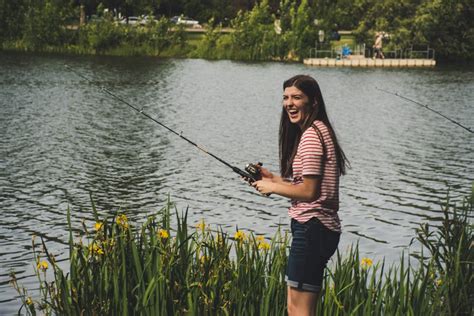 Person on White Boat Fishing on Body of Water · Free Stock Photo