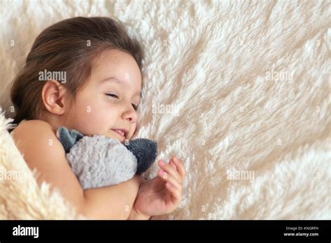 Girl Sleeping In Bed Stock Photo Alamy