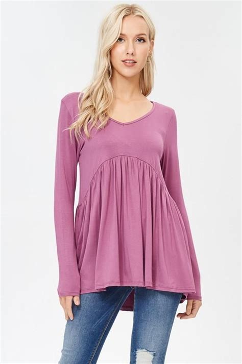 A Soft Long Sleeve V Neck Top Featuring A Baby Doll Effect Hem Looks