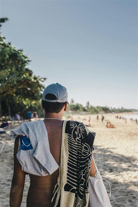 Back View of a Man on the Beach · Free Stock Photo