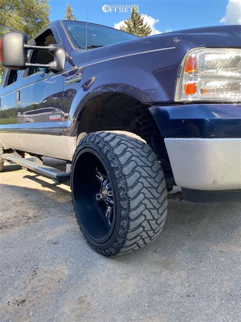 2006 Ford F 250 Super Duty With 22x12 44 Moto Metal Mo969 And 33125r22 Atturo Trail Blade Mt