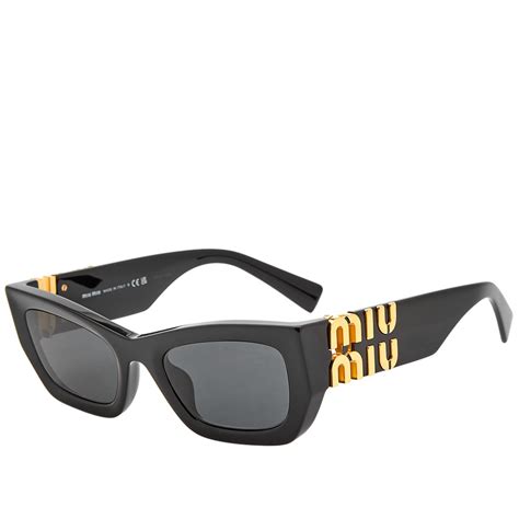 Miu Miu Eyewear 09ws Sunglasses Black And Grey End