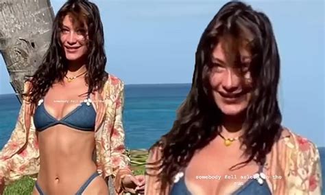 Bella Hadid Showcases Her Trim Figure In A Tiny Blue Bikini After