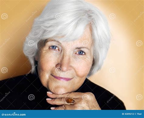 Senior Woman On Pastel Yellow Stock Photo Image Of Polo Person 4309212