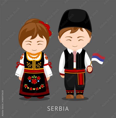 Serbs in national dress with a flag. Man and woman in traditional ...