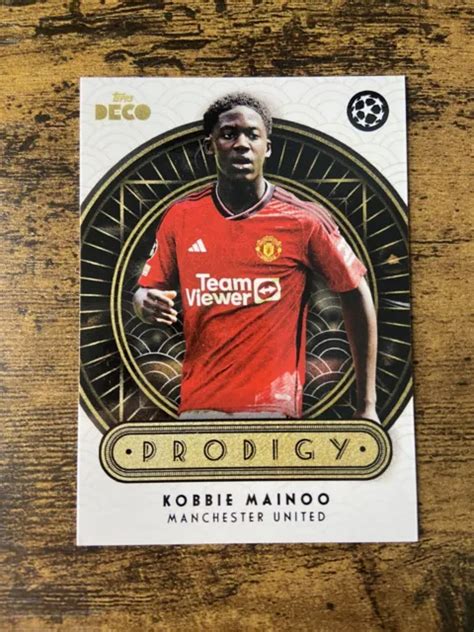 KOBBIE MAINOO PRODIGY Topps déco 2023 24 Manchester United Champions