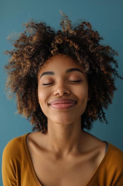 Premium Photo Joyful African American Woman Smiling With Eyes Closed