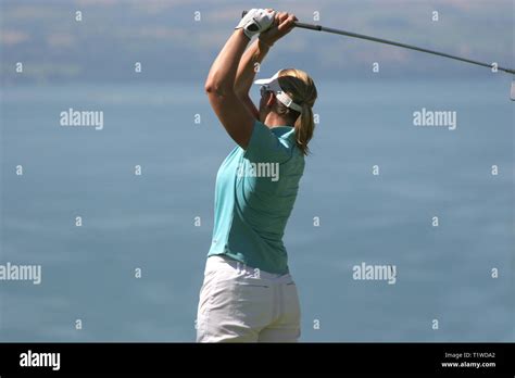 Lady golf swing Stock Photo - Alamy