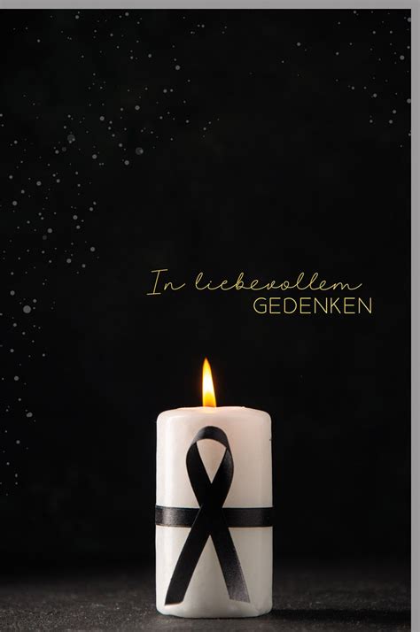 A Candle With A Black Ribbon On It And The Words In Remembrance Gedenken