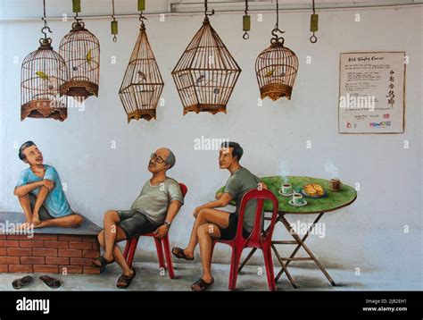 Street Art Murals By Yip Yew Chong Depicting A Songbird Market In