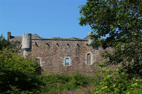 The imposing walls of Castle Leoch... | Outlander tour, Scotland tours, Castle