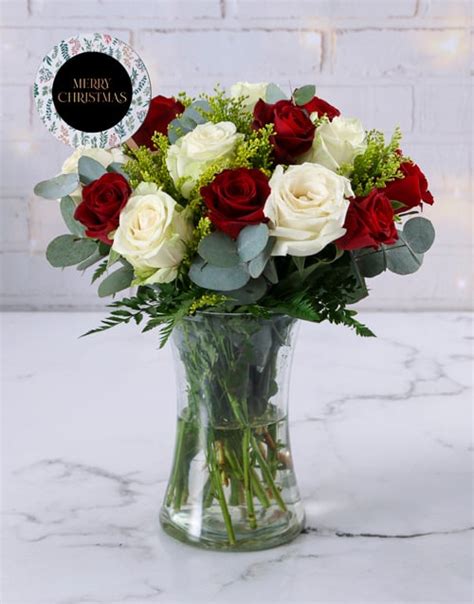 Merry Christmas Red Rose Arrangement | Roses Gifts | NetFlorist