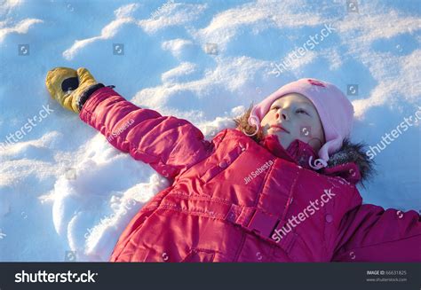 Little Girl Lying Snow Stock Photo 66631825 | Shutterstock