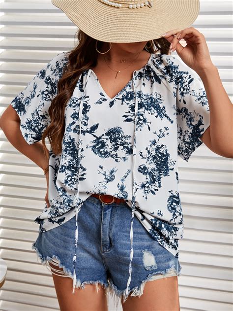 mais Blusa impressão floral gola de gravata manga de raglan