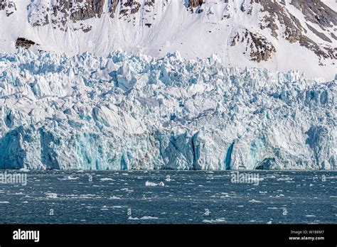 Blue glacier in Kongsfjorden fjord in Svalbard, a Norwegian archipelago ...