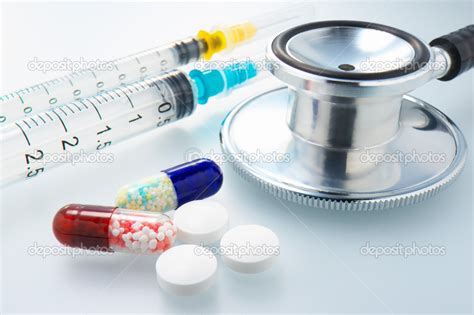 Closeup Of Medicines Syringes And Stethoscope Stock Photo By