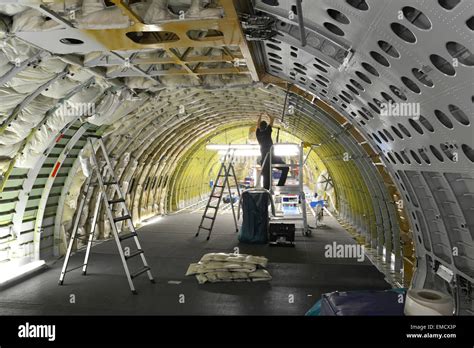 Airplane construction in a hangar Stock Photo - Alamy