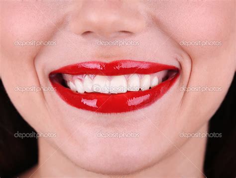 Smiling woman with red lips close-up — Stock Photo © belchonock #47960137