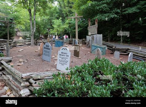 Funny headstones in the Lumberjack Graveyard at the Dollywood amusement park in Pigeon Forge, TN ...