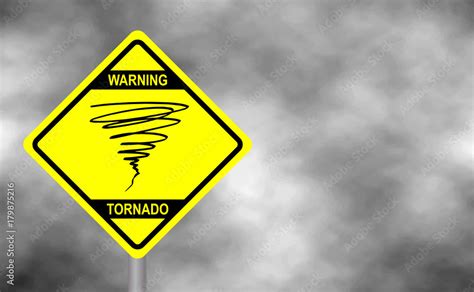 Warning tornado sign road. Yellow hazard warning sign against grey sky - tornado warning, bad ...