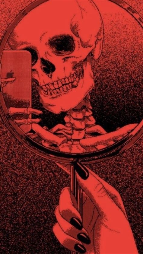 A Hand Holding A Magnifying Glass Looking At A Skull In It S Reflection