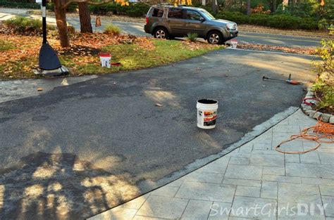 Painting The Asphalt Around The Edge Of Stamped Concrete Asphalt