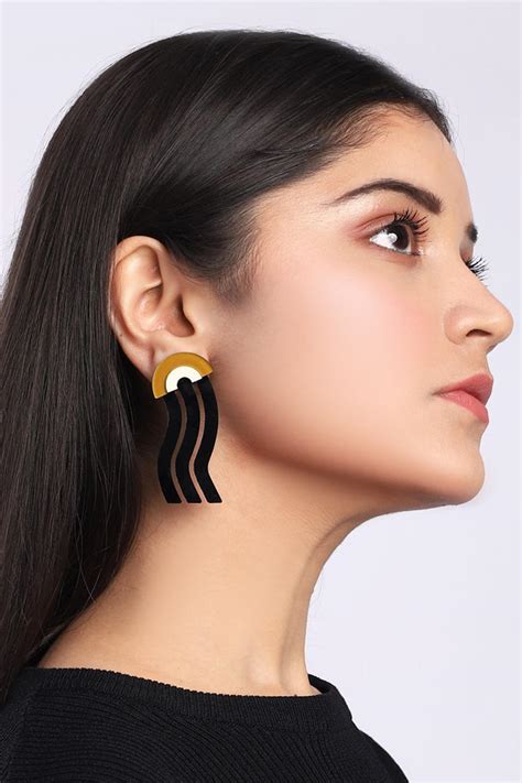 Buy Brown Mismatched Waves Stud Earrings by The YV Brand by Yashvi Vanani Online at Aza Fashions.