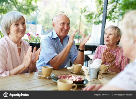 Group Of Smiling Elderly People — Stock Photo © Pressmaster 144868183