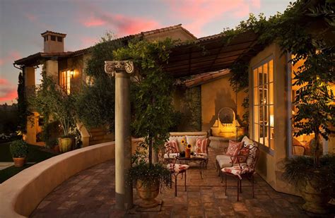 Step inside this breathtaking Tuscan farmhouse style home in Montecito