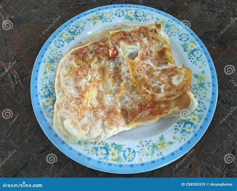 Comida Tradicional Malaya De Pan Plano Llamada Roti Canai Imagen De