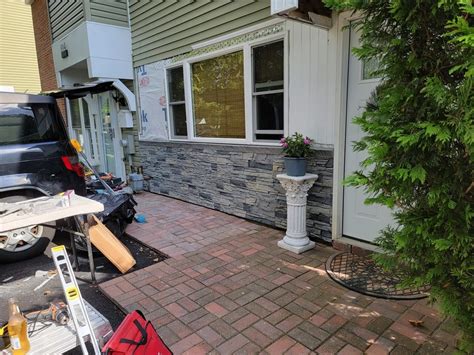 Johnny was remodeling his home on a budget and used Northern Slate Stacked Stone for a beautiful ...