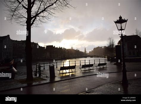 Twilight on the Amstel RIver, Amsterdam Stock Photo - Alamy