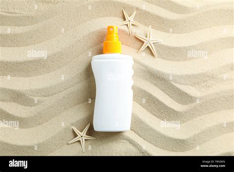 Clear Sea Sand With Sunscreen And Starfishes Space For Text Summer