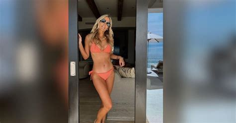 Molly Sims Shows Off Toned Physique In Bright Orange Bikini Photos