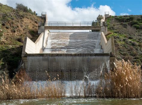 Overflow of the Dam after Heavy Rain. Water Reservoir Flowing in a ...