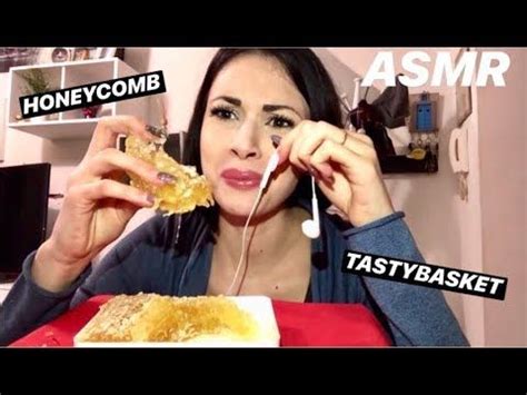 A Woman Is Eating Food From A Plate With The Words Asmr Above Her