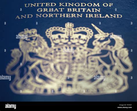 Stock Image New Issue Blue And Gold British Passport Of The United