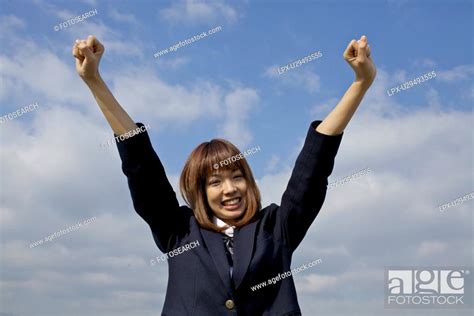 High School Student Holding Arms Up Stock Photo Picture And Royalty