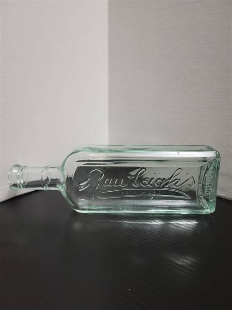 S Rawleigh S Vintage Medicine Bottle Aqua Iridescent Embossed