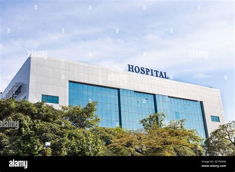 Modern building facade with Hospital word signage Stock Photo - Alamy