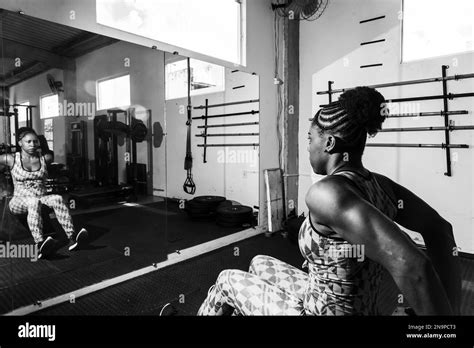 Determined Woman Doing Arm Exercises At The Gym Body Strengthening