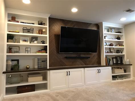 Custom Built Ins For Media Wall With Walnut Herringbone Accent Feature By S Basement Living