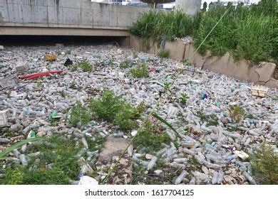 Plastic Garbage River Pollution Environment Concept Stock Photo