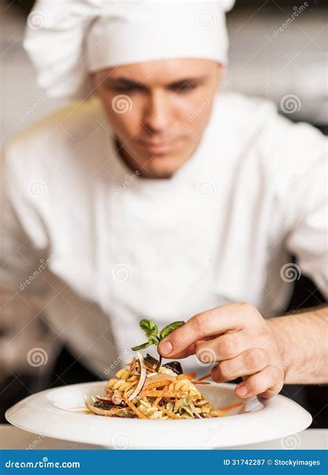 Chef Decorating Pasta Salad With Herbal Leaves Stock Image Image Of